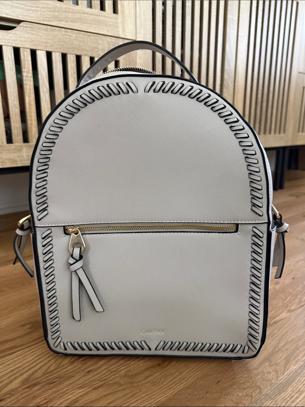 Calpak Cream Saffiano Backpack with Whipstitch Trim